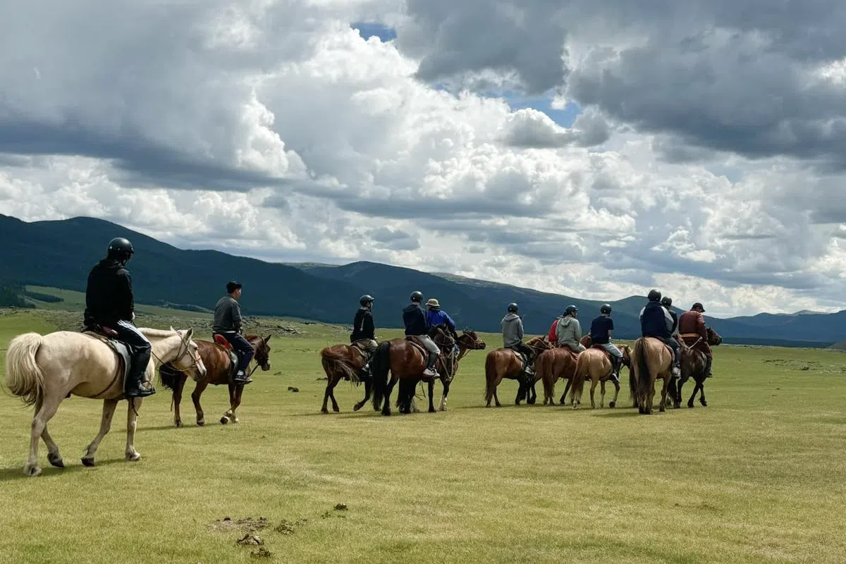 Horse riding in Mongolia grasslands